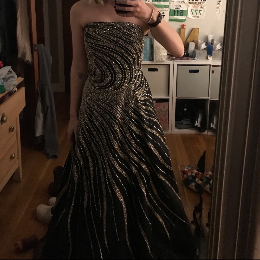 Size 6/8 black and gold prom gown